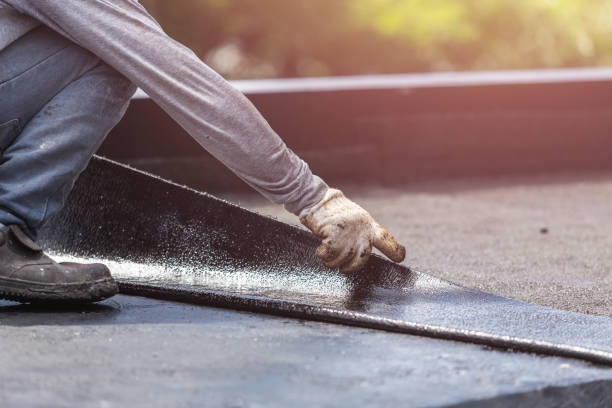 Professional Exterior Waterproofing technician working in Lake Mills, WI